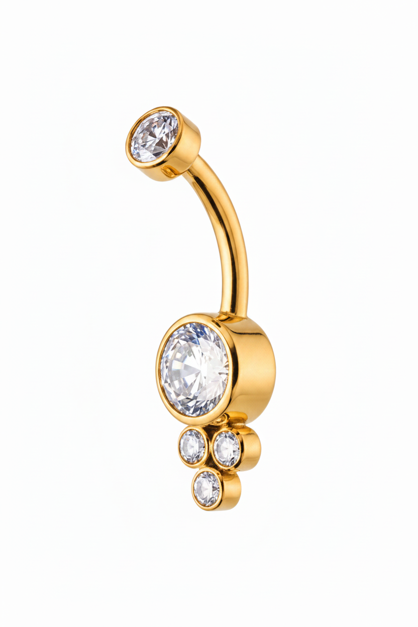 Elegantes Bauchnabelpiercing Aurielle aus handpoliertem medizinischem Edeltitanium mit großem Premium Cubic Zirkonia und drei kleineren funkelnden Steinen sowie Innengewinde in Gelbgold gefärbt