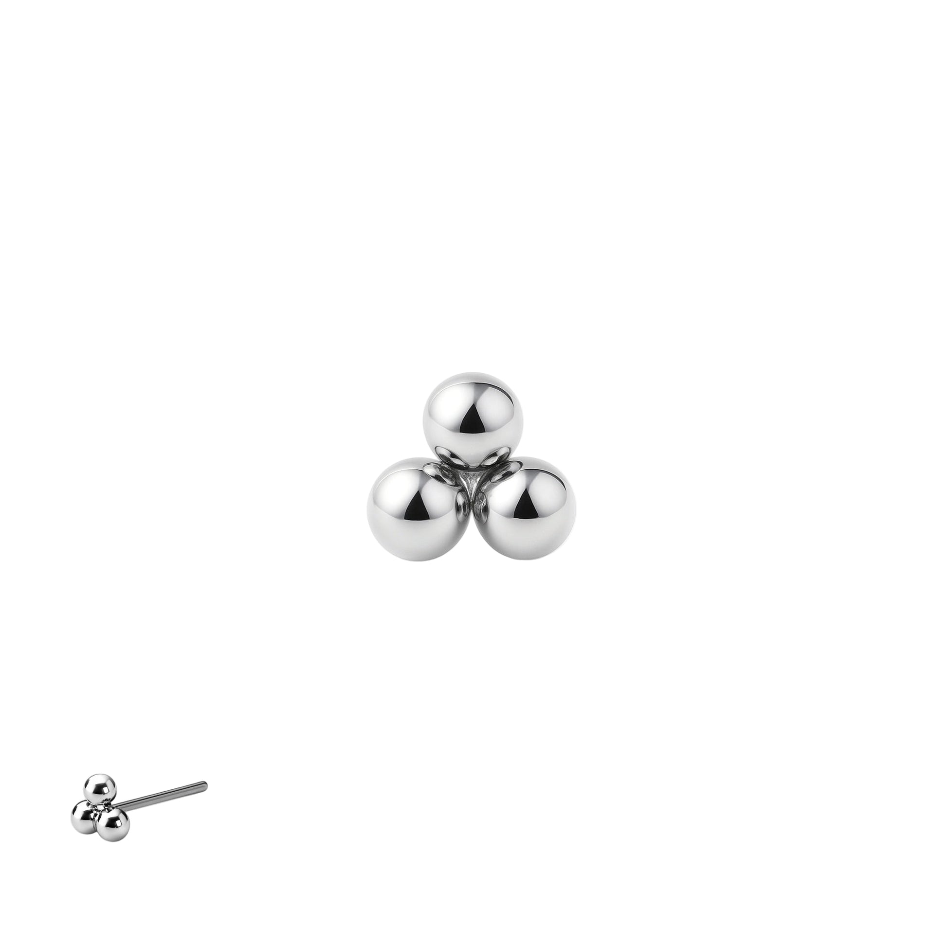 Drei Kugeln aus medizinischen Edeltitanium eng aneinander gereihnt.